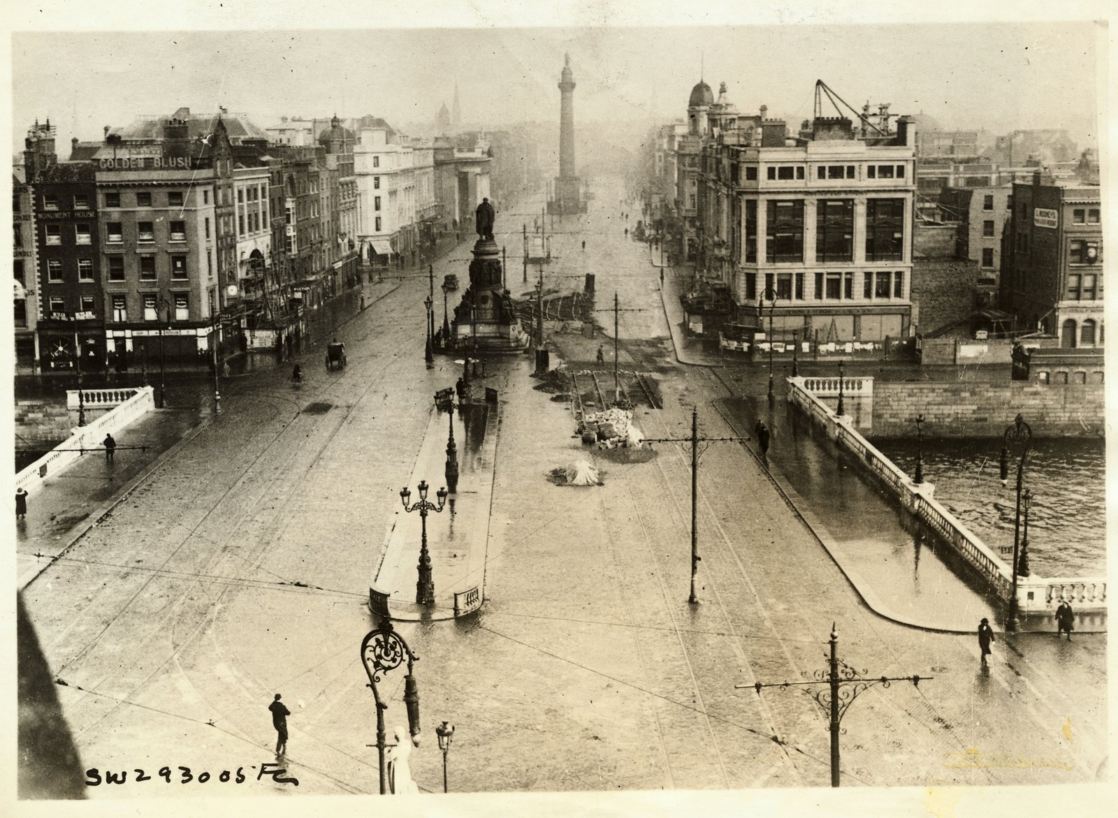 Image - BEFORE THE STORM: O'Connell/Sackville Street photographed a few months before the Civil War, still being repaired after 1916 (Credit: Getty Images)