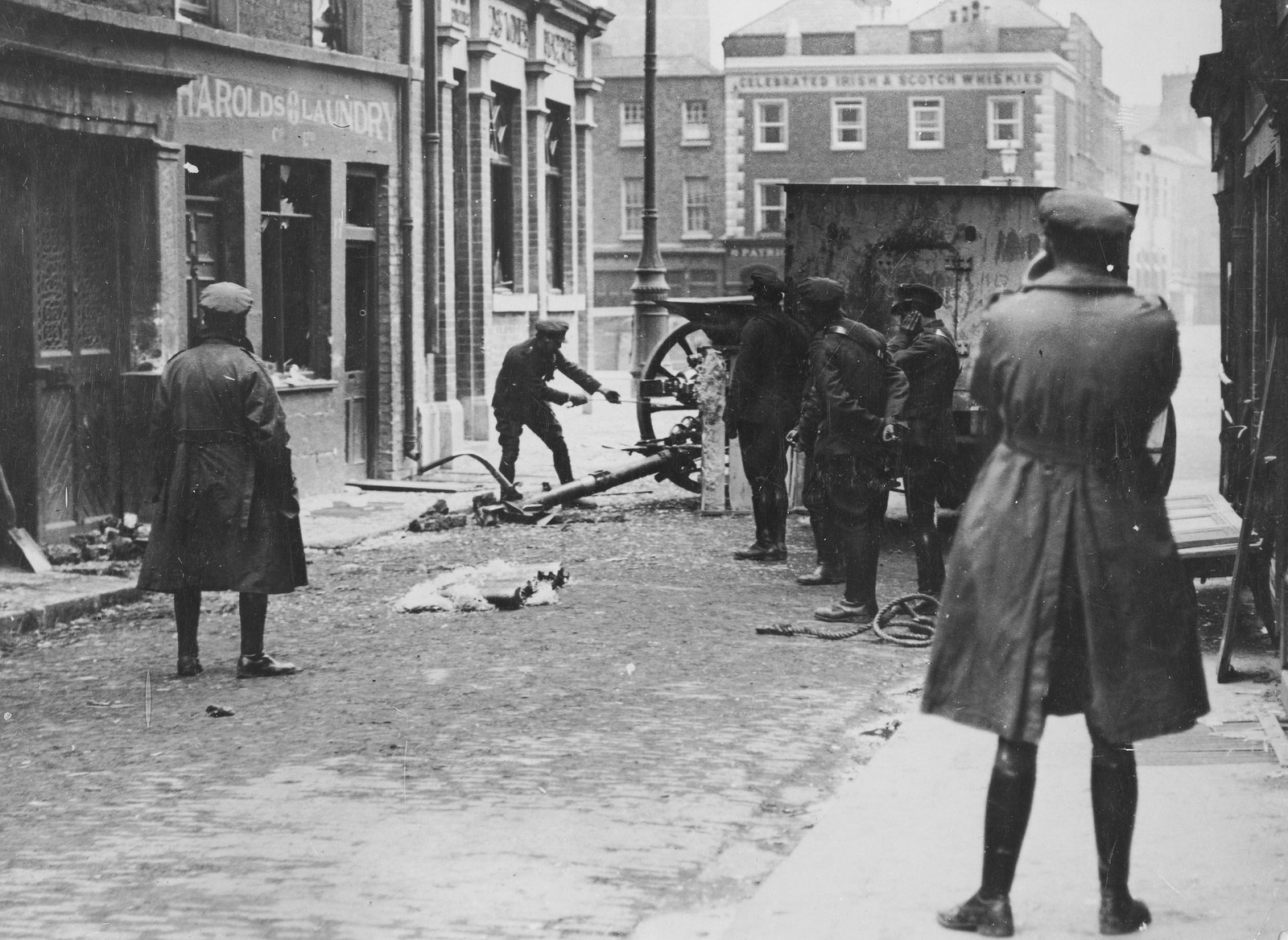Image - An 18-pounder gun fires on the Four Courts from Bridge Street. Image courtesy of the National Library of Ireland