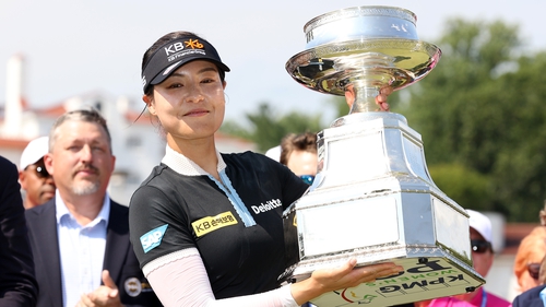 In Gee Chun of South Korea poses with the championship trophy