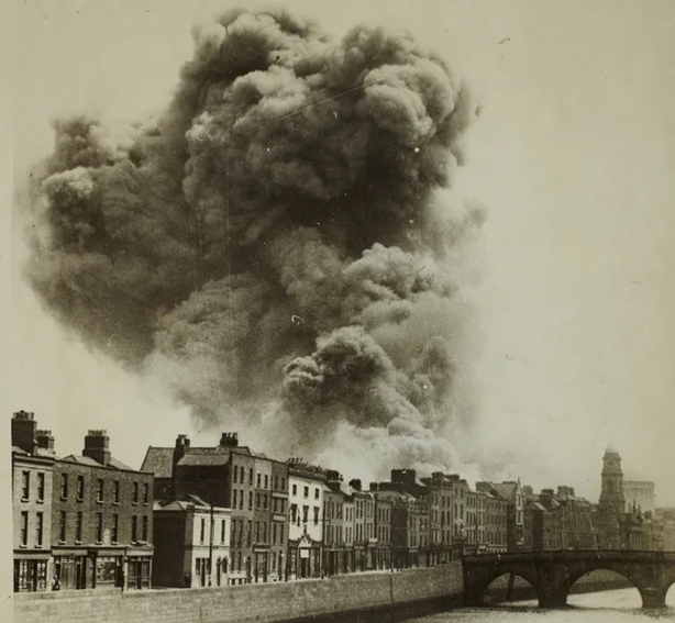 Smoke billowing over Dublin rooftops, following an explosion at the Four Courts Photo: National Library of Ireland, 4 July 1922