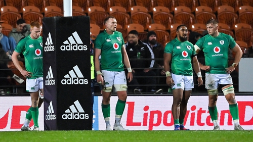 Ireland's players look on after conceding their fourth try of the game