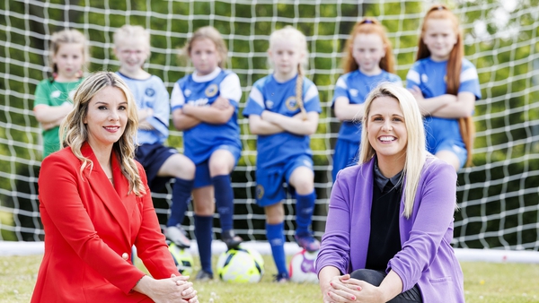 RTÉ Sport presenters Marie Crowe and Jacqui Hurley at the launch of RTÉ Sport's coverage of UEFA Women's Euro 2022 with Lía O'Neill (7), Quinn Murphy (8), Sofia Mooney (8), Emily McCabe (9), Rhea McGlynn (8) and Molly McGlynn (9) of the FAI Summer School