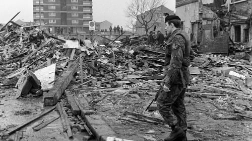 A soldier stands in the shattered remains of McGurk's bar in North Queen Street, Belfast, where 15 people died in a bomb blast