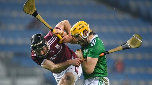 Galway's Padraic Mannion (L) and Seamus Flanagan of Limerick grapple during the 2020 All-Ireland semi-final