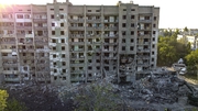 At least 21 people were killed when Russian missiles struck an apartment building in Odesa