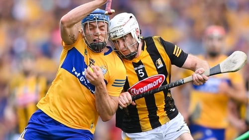 Clare's Shane O'Donnell is tackled by Michael Carey of Kilkenny