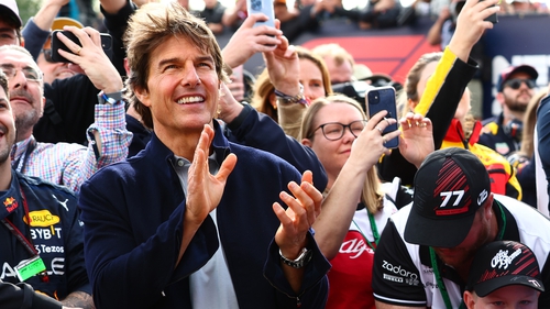 Tom Cruise applauds at the Podium celebrations during the F1 Grand Prix of Great Britain at Silverstone