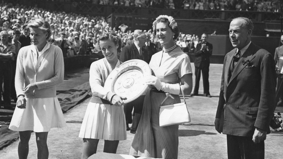 American tennis player Maureen Connolly receives the women's singles trophy from the Duchess of Kent on the centre court at WimbledonOriginal Publication: People Disc - HC 0276 (Photo by Topical Press Agency/Getty Images)