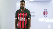 Divock Origi poses in his new jersey after six years with Liverpool