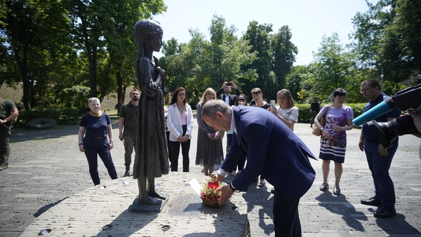 Micheál Martin lays a wreath at foot of the Bitter Memory of Childhood statue, which commemorates the victims of the Great Famine in 1932-33