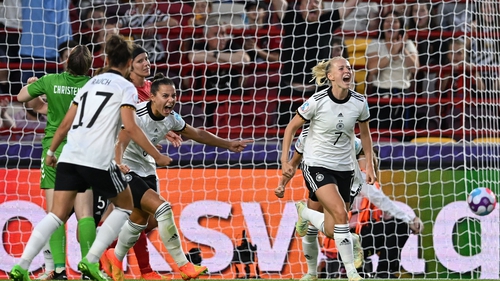 Lea Schuller celebrates with team-mates after scoring Germany's second goal