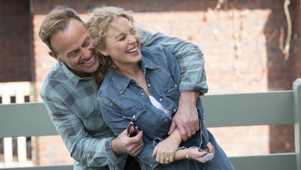 Jason Donovan and Kylie Minogue donned their denim for their Neighbours return