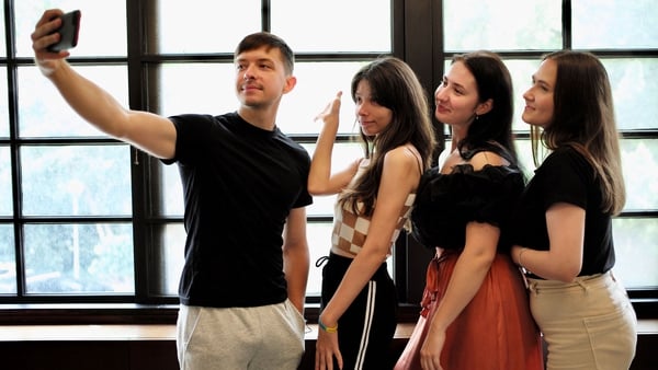 Roman Koval, Karyna Myshnova, Anna Fursyk and Alina Kuprii take a selfie at Tunghai University in Taichung