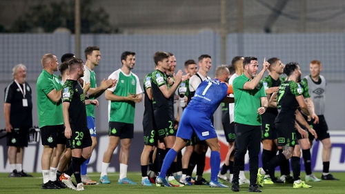 Stephen Bradley and the Shamrock Rovers players celebrate in front of their travelling support