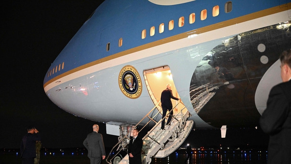 US President Joe Biden makes his way onboard Air Force One before departing from Andrews Air Force Base in Maryland