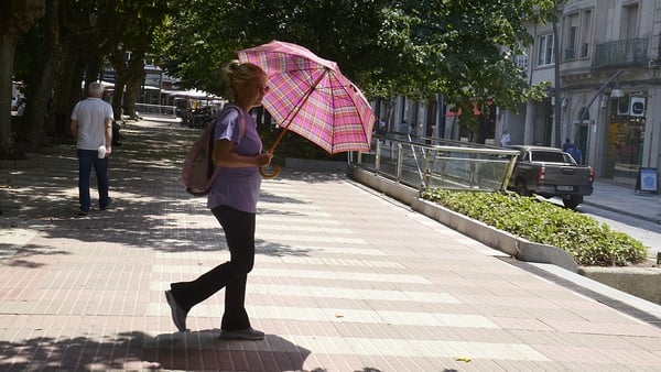 A woman walking in Orense in northern Spain during this week's heatwave
