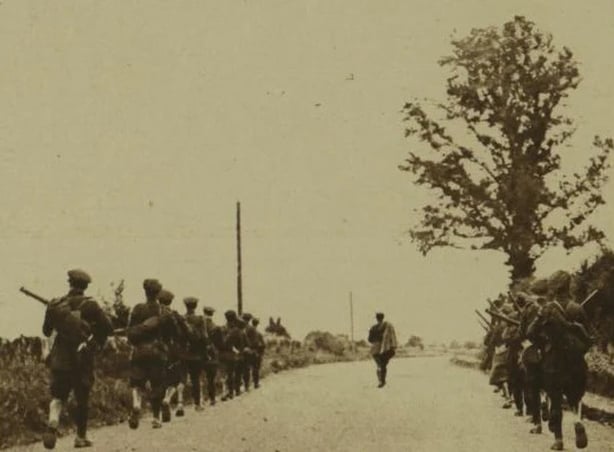 Free State troops walk along the road fearing Irregular ambush Photo: Illustrated London News, 5 August 1922
