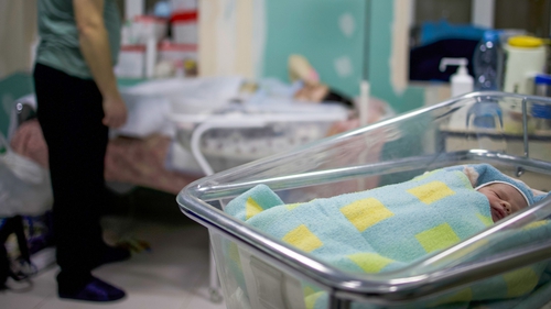 A newborn baby in the bomb shelter of a Ukrainian maternity hospital