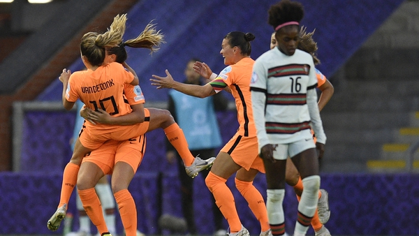 Netherlands' midfielder Danielle van de Donk (L) celebrates scoring her team's third goal