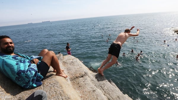 Swimmers at the Forty Foot in Dublin today (Photo: Leah Farrell/Rollingnews)
