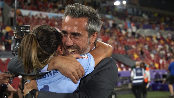 Jorge Vilda, head coach of Spain, and Marta Cardona celebrate victory over Denmark in the final group game