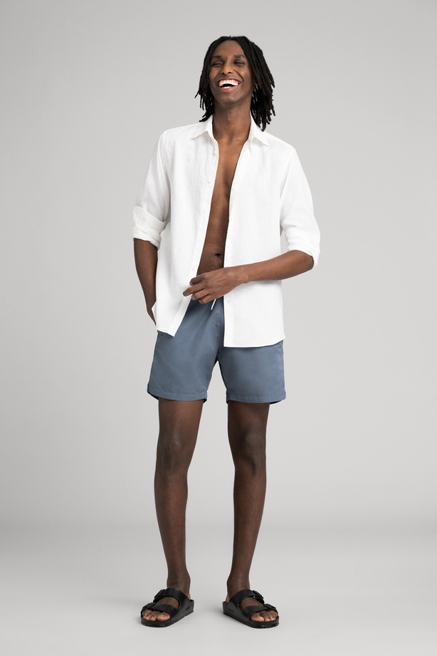 Asket the linen shirt; Cold Blue swim shorts