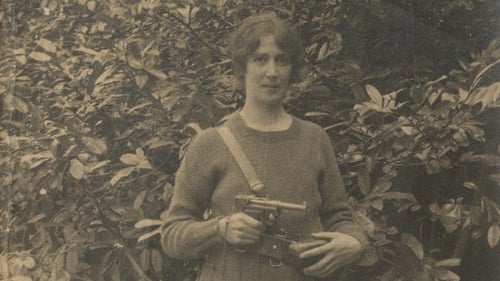 Máire "Mollie" Gill holding a revolver. Credit: Loretta Clarke Murray Collection, John J Burns Library, Boston College