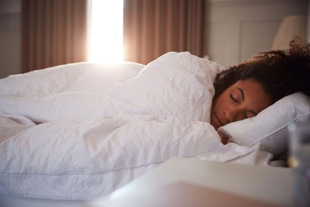 woman asleep in bed