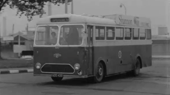 Meda Shanahan undertakes the 'E' class driving test for school buses in Mallow, County Cork, 1967.