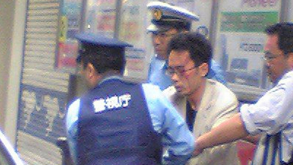 Tomohiro Kato was arrested at the scene