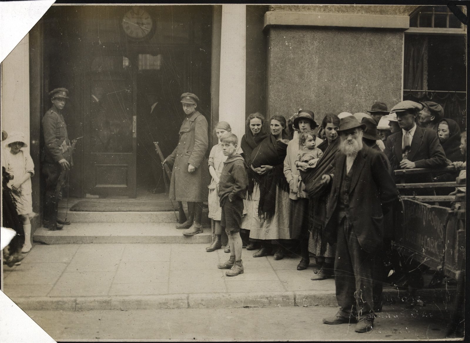 Image - Group of people outside the National Army headquaters in Cork city, the Imperial Hotel. Image courtesy of the National Library of Ireland