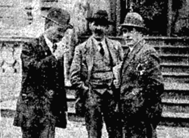 Thomas Johnson, Secretary, Irish Labour Party and Trades Union Congress (left) chatting with two of the of the delegates at the Labour Congress in Dublin. Photo: Freeman's Journal, 8 August 1922