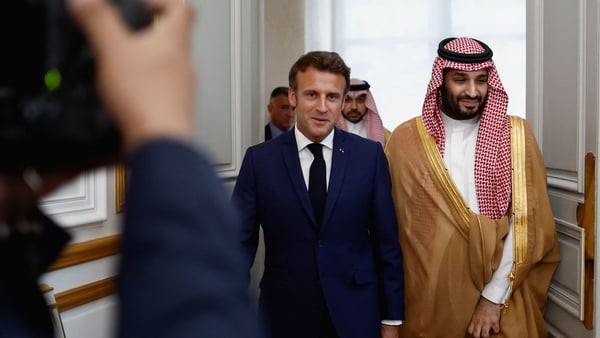 The dinner hosted by Emmanuel Macron was the latest step in the diplomatic rehabilitation of Prince Mohammed bin Salman (R), the de-facto leader of the Saudi kingdom