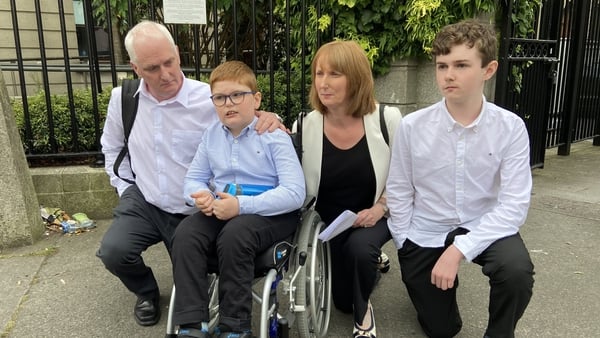 Henry Nally was accompanied in court by his mother Deborah, father Seamus and brother Luke