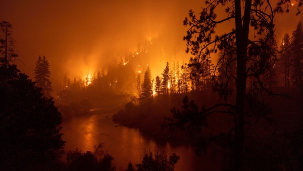 Flames burn in the Klamath National Forest northwest of Yreka, California