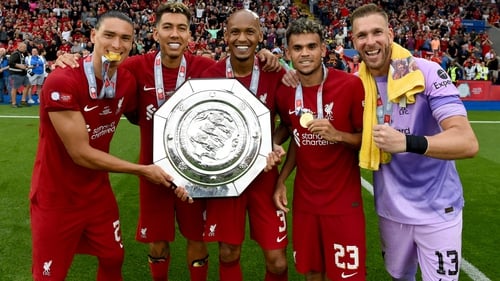 Fabinho is flanked by Darwin Nunez, Roberto Firmino, Luis Diaz and Adrian as they pose with the Community Shield