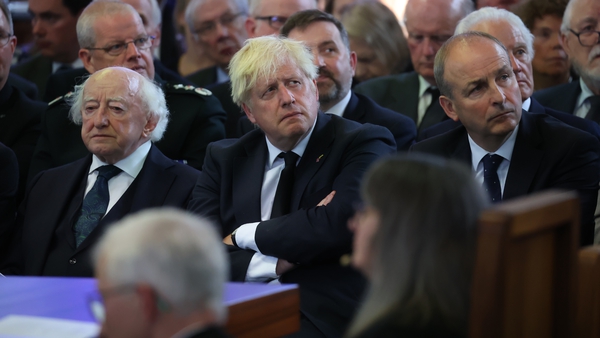 President Michael D Higgins, Boris Johnson and Micheál Martin at today's funeral