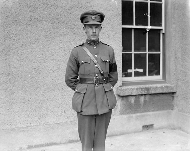 Black and white photo of man in uniform