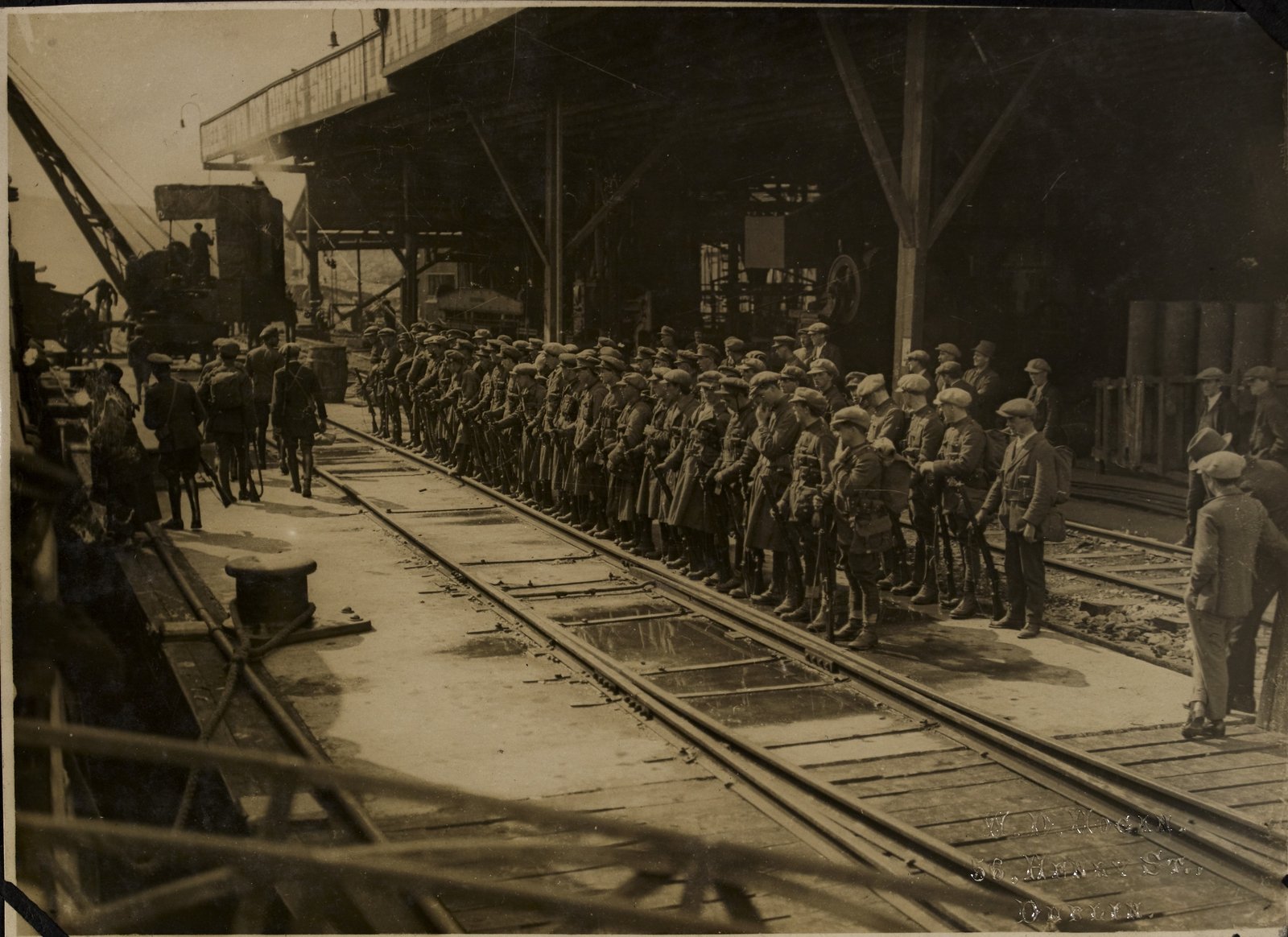 Image - Detachment of troops at Passage West about to start the march to Cork. Image courtesy of the National Library of Ireland