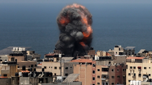 Smoke and fire billowing from an Israeli air strike in Gaza City today