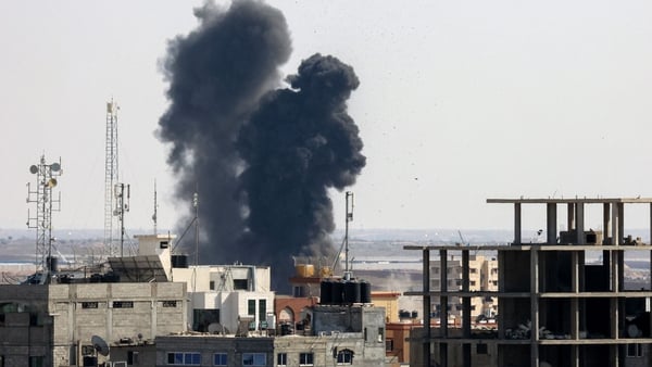 Smoke billows from a building in Rafah in southern Gaza after an Israeli strike
