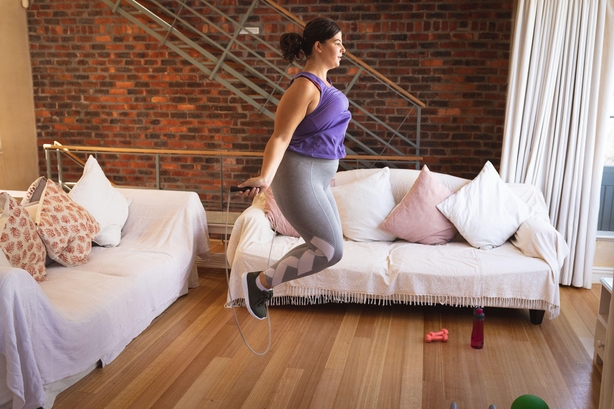 Woman exercising at home