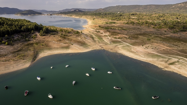 Boats are moored along the Entrepenas reservoir, which is at 31% capacity, in Sacedon, Guadalajara province, Spain