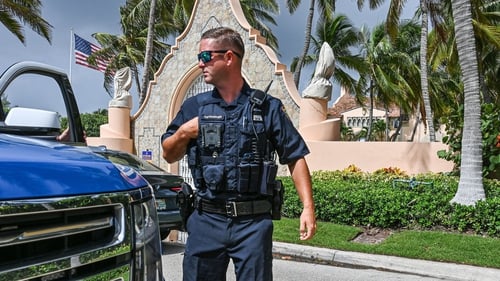 Local law enforcement officers in front of Donald Trump's Mar-a-Lago resort today