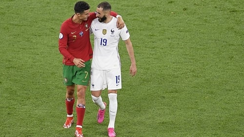 Cristiano Ronaldo (L) and Karim Benzema pictured after Portugal drew with France at Euro 2020 last summer