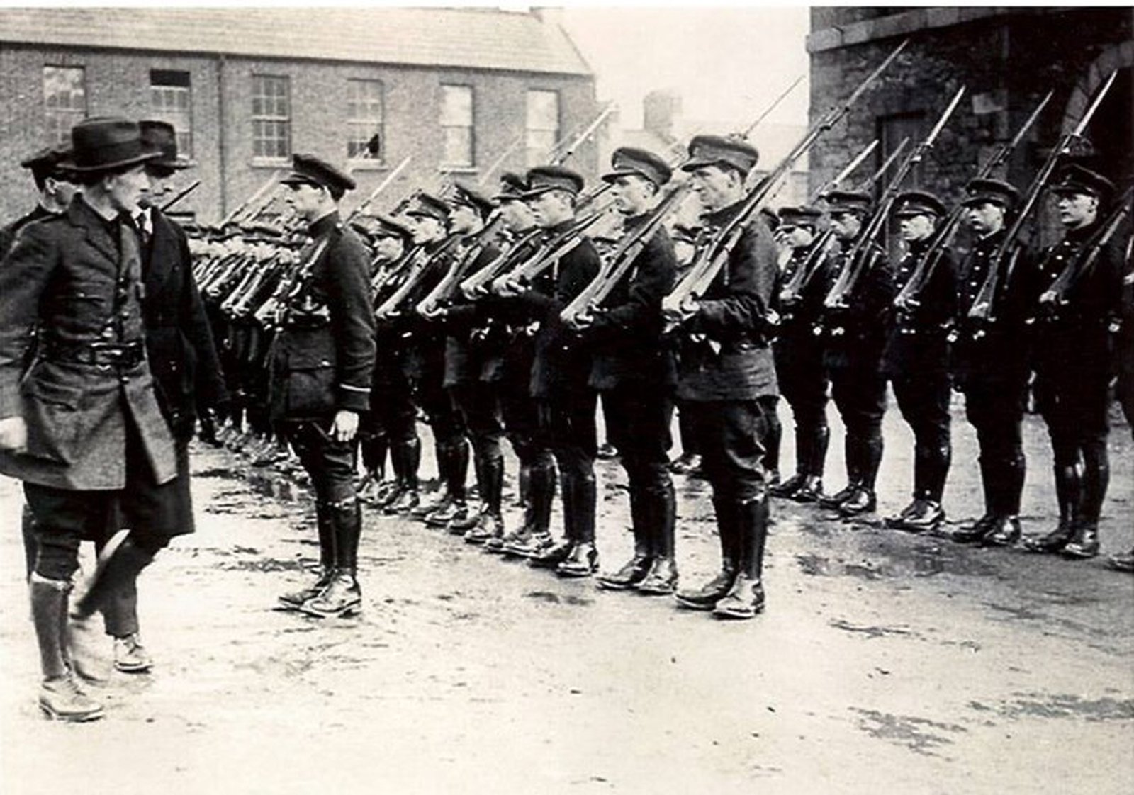 Image - General Richard Mulcahy inspecting troops. He knew how raw and unformed this new army was (Pic: Getty Images)