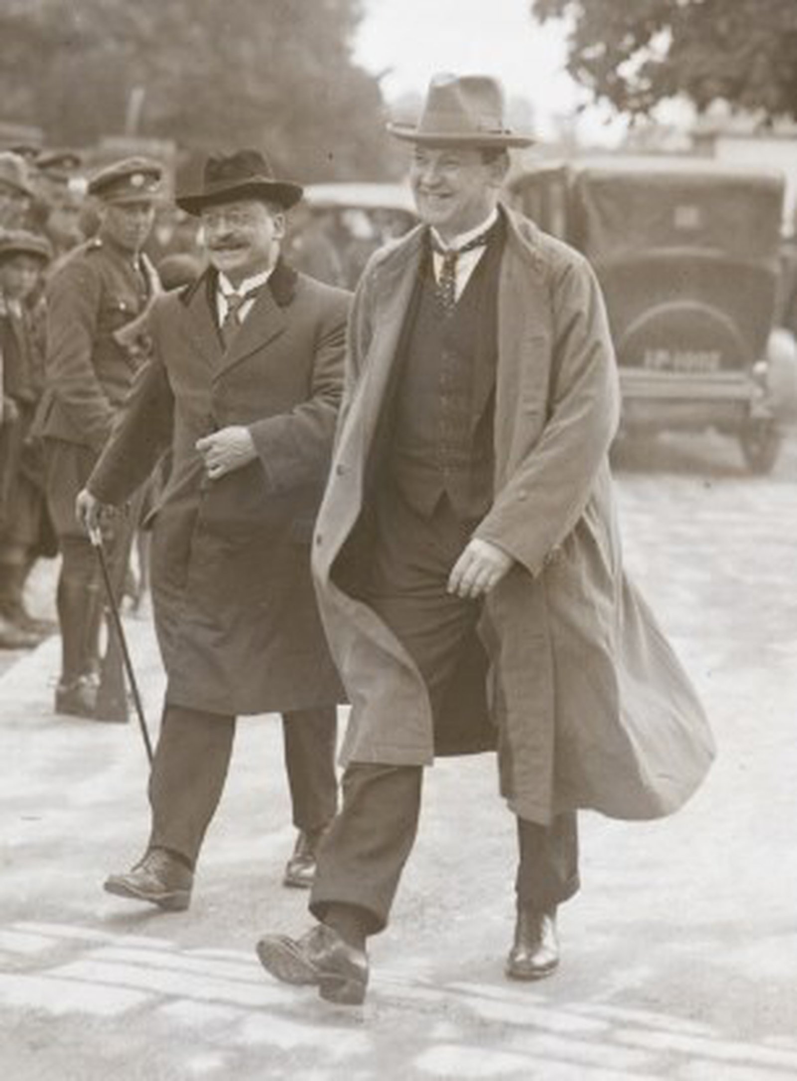 Image - Rare smiles from the two men at General Seán Mac Eoin's wedding in June 1922 (Pic: National Library of Ireland)