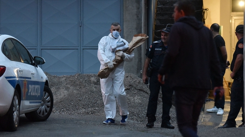 Investigators working at the scene where a gunman opened fire in Cetinje