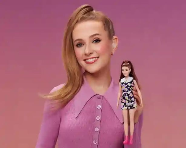 Rose Ayling-Ellis poses with the new Barbie doll (Mattel/PA)