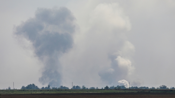 An image shows smoke rising following an alleged explosion in the village of Mayskoye in Crimea